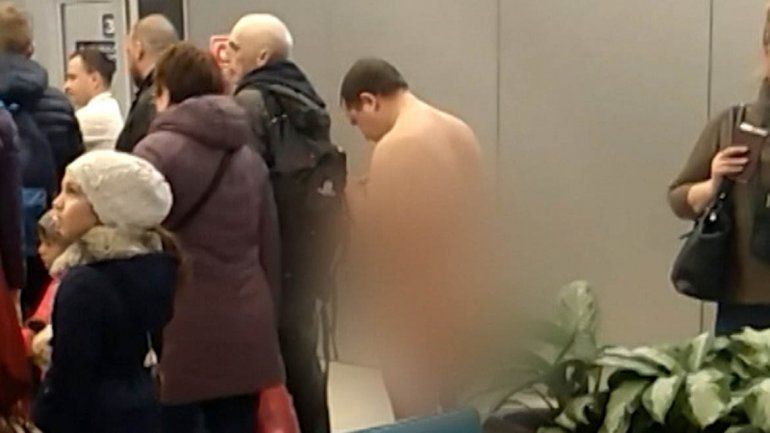 They arrested a pbadenger who was trying to get naked in the plane