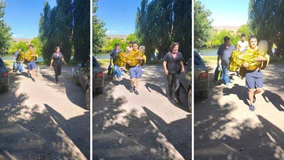 Dramático rescate: agarrados a las ramas de un árbol para que no se los lleve el río Chimehuin