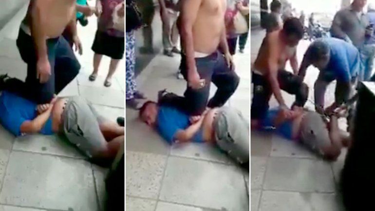 En un video se ve cómo los vecinos lo redujeron e insultaron.