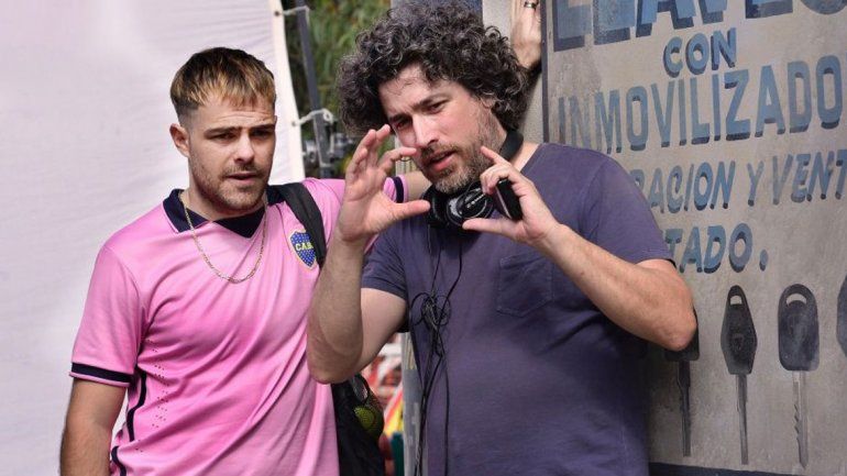 El actor junto al director del film