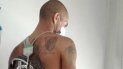 Maidana, de espaldas, con el tatuaje del Millo a flor de piel.