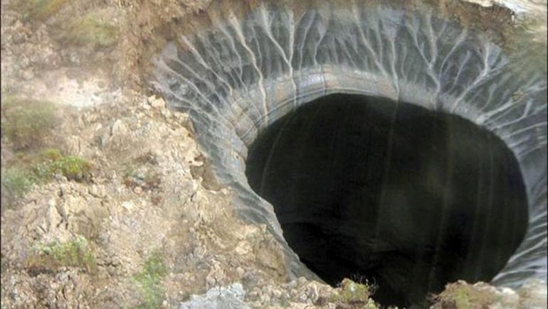 Los agujeros del fin del mundo de Siberia eran un misterio hasta ahora. Los agujeros del fin del mundo de Siberia eran un misterio hasta ahora.