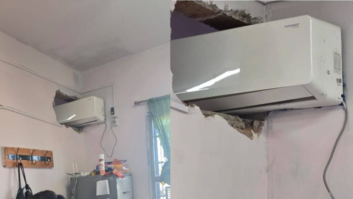 La insólita instalación del aire acondicionado fue dada a conocer por vecinos. Foto gentileza: Centenario Digital.
