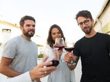 happy-positive-people-toasting-wine