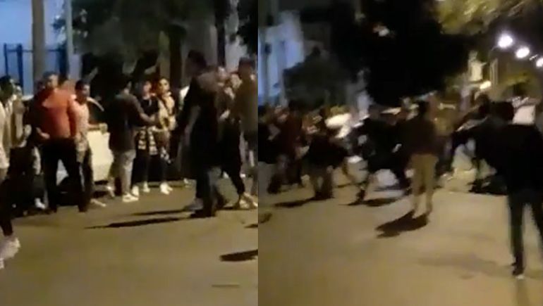 Video: dos grupos de jóvenes a las piñas a la salida de una fiesta