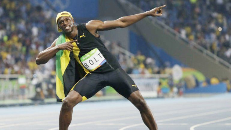 Usain Bolt y su típico festejo. En una carrera emotiva logró su oro Nº 7.