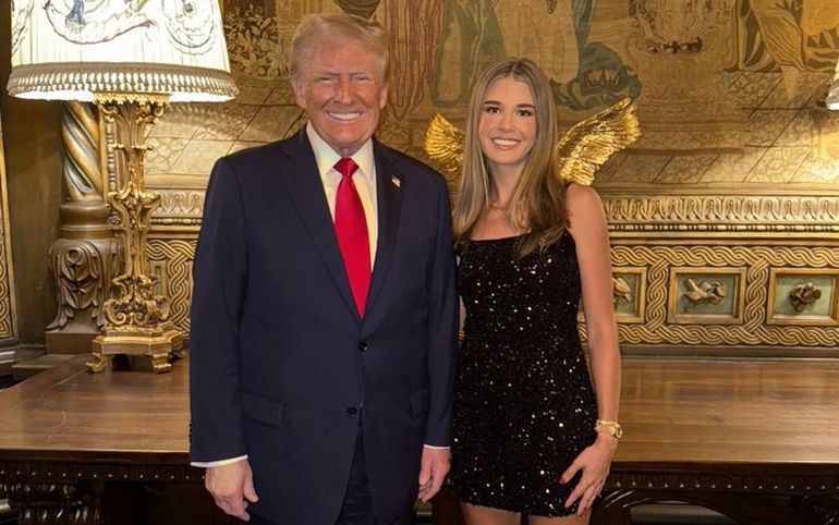 Donald Trump con su nieta, Kai.