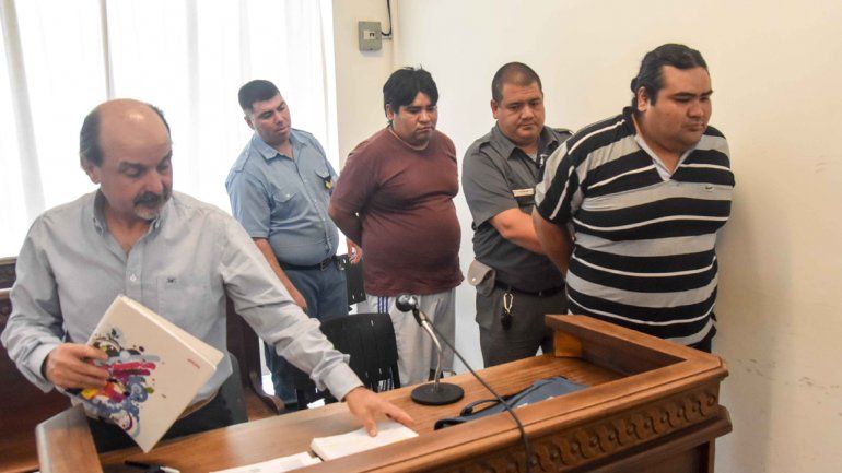 Carlos y Cristian Burgos ayer en la audiencia de formulación de cargos.