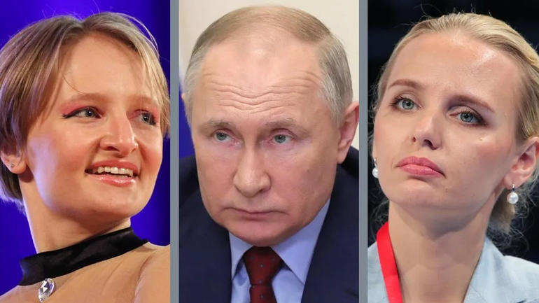 Vladimir Putin con sus dos hijas