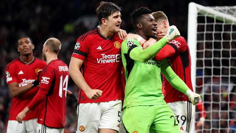 Onana y Maguire festejan el triunfo luego de la atajada del arquero del United.&nbsp;