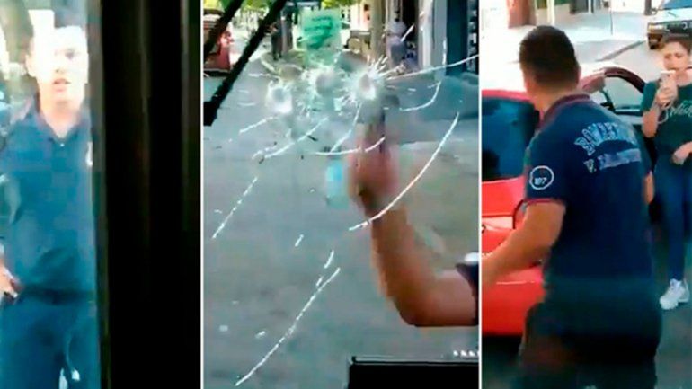 Video viral: un bombero destrozó el parabrisas de un colectivo con una barreta