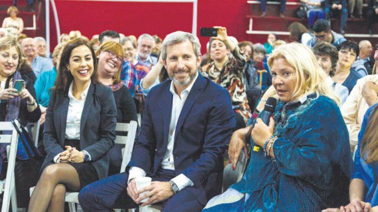 La candidata expulsada junto a Lilita Carrió y el ministro del Interior