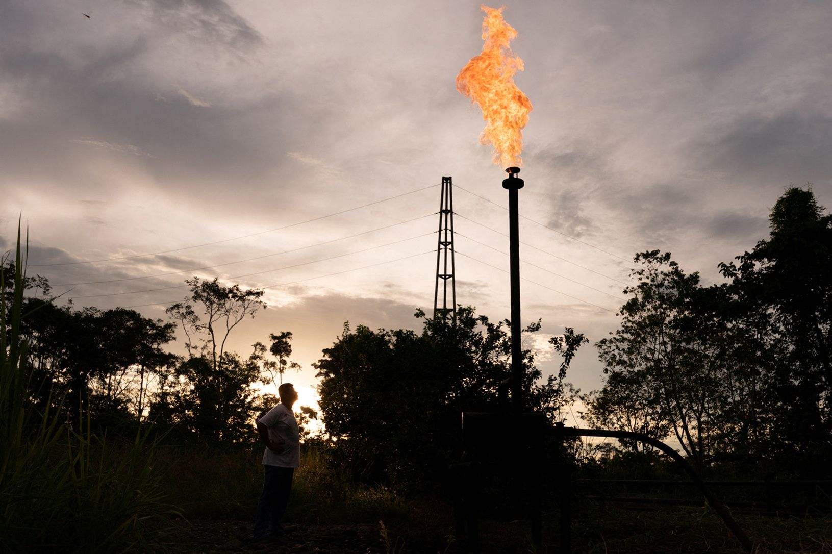 Oil and gas pipelines are pictured on the side of a road near a state-owned oil company Petroecuados plant in Lago Agrio, Ecuador May 3, 2022. Picture taken May 3, 2022. REUTERS/Santiago Arcos
