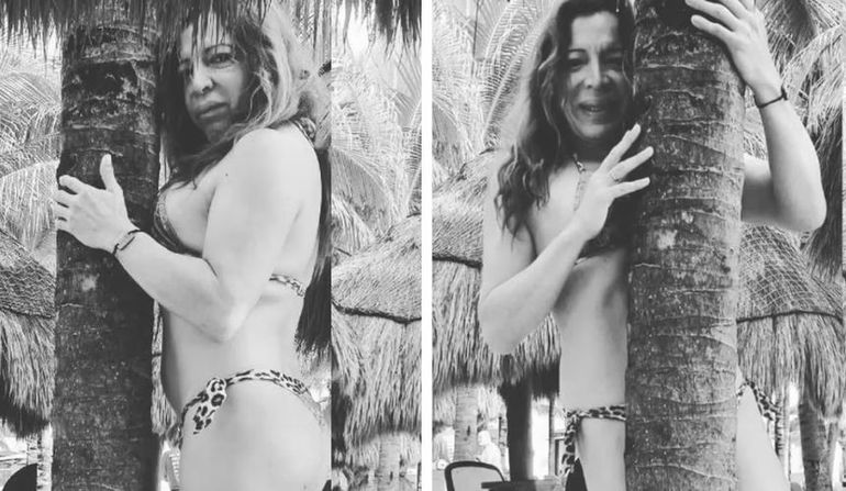 La divertida producción de fotos de Lizy Tagliani, abrazando una palmera en microbikini. La divertida producción de fotos de Lizy Tagliani, abrazando una palmera en microbikini.