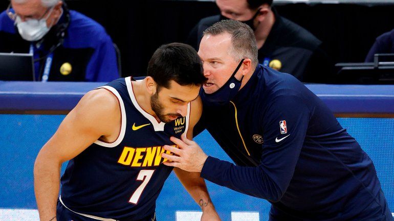Campazzo con su entrenador.