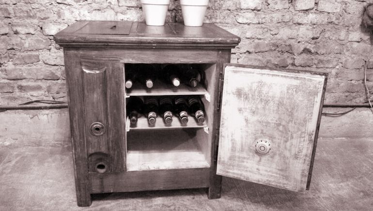Las viejas conservadoras de madera necesitaban barras de hielo.