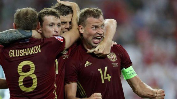 Los rusos, organizadores del próximo Mundial, festejan el empate.