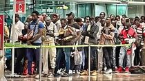 Migrantes en el aeropuerto internacional de Nicaragua.