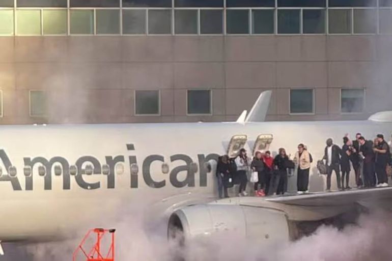 Un avión de American Airlines se incendió y evacuaron a más de 170 pasajeros en medio de las llamas