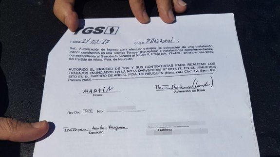 Una nota escaneada, con firma del lonco de los Fvta Xayen, autoriza a TGS a ingresar a los campos tomados.