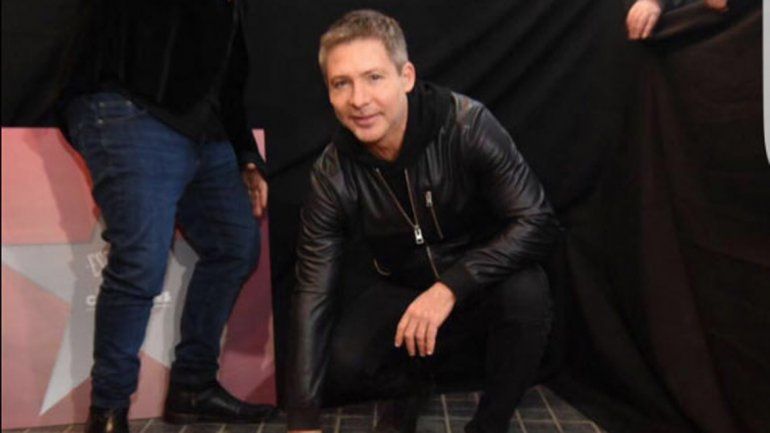 El productor junto a su estrella en la puerta del teatro El Nacional.