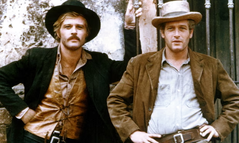 Robert Redford y Paul Newman, como Sundance Kid y Butch Cassidy, dos temibles ladrones de bancos.