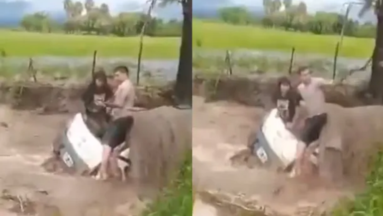 El episodio tuvo lugar luego de que se inundara la zona y la corriente tape el vehículo en el que circulaban.