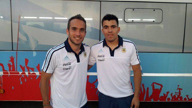 Fernando Belluschi y el neuquino Marcos Acuña