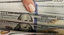 Fuerte caída del dólar oficial